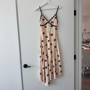 Peppermayo Amelia Asymmetrical Cream and Black Dress